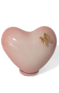 Handmade baby cremation urn heart on support